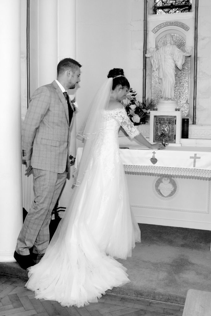 Black & White Image - Groom & Bride Signing Register